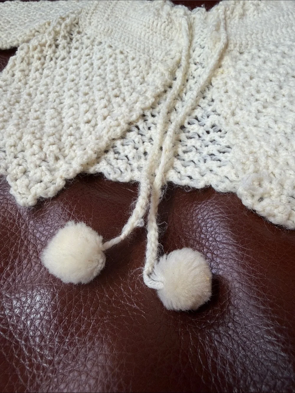 1950’s Cream Knit Open-Front Baby Sweater with Pom Tie